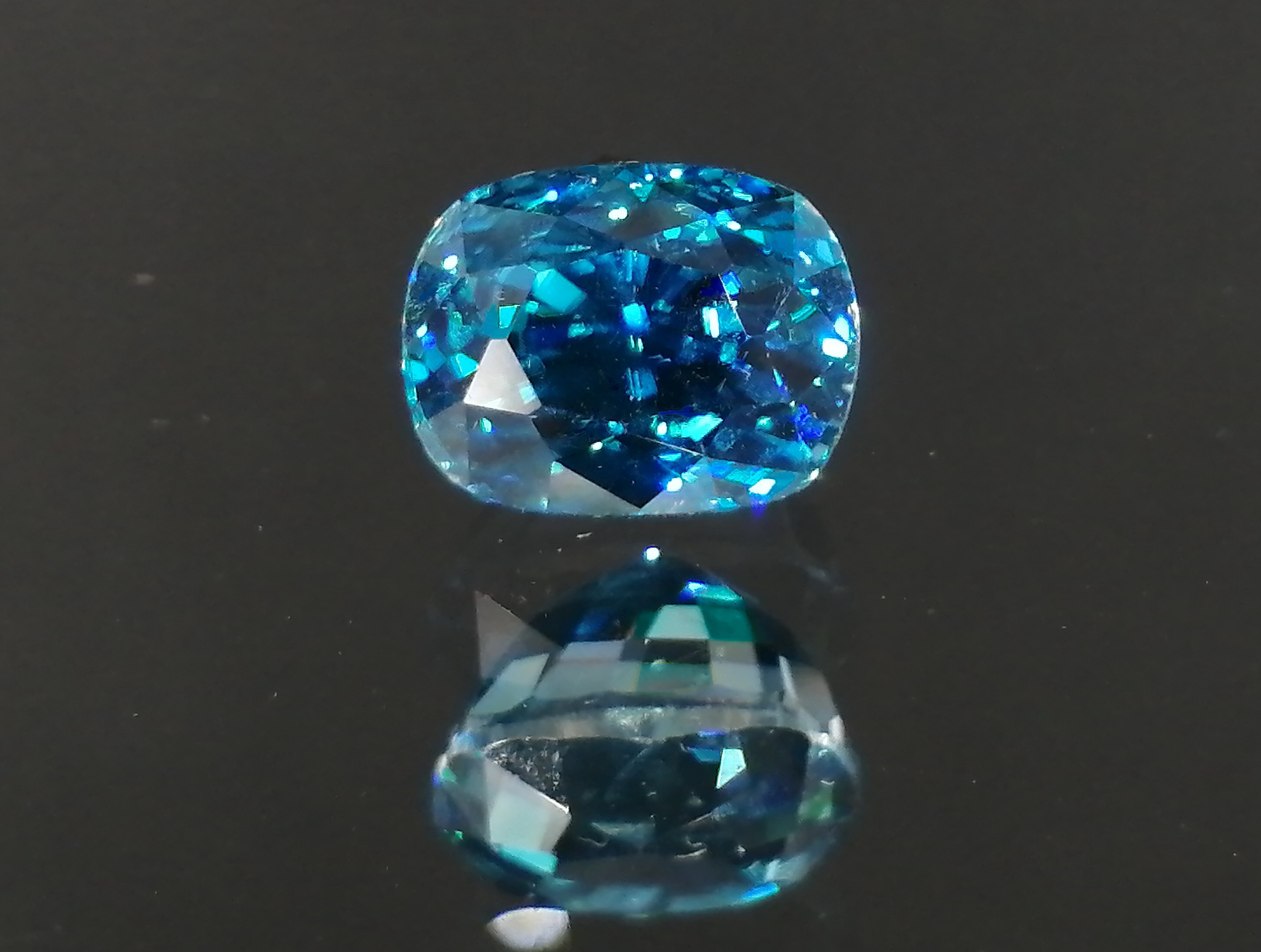 Exceptional and unique AAA color grade best possible blue color for natural blue Zircon 6ct cushion cut