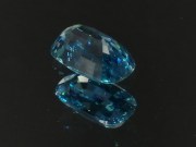 Pill shaped blue Zircon cushion - pretty wide while shallow, best value affordable zircon gem with sky blue C+ to B- color grade. 