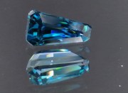 Grade AAA color, rare extremely high hue fancy tapered baguette / trapezoid natural blue zircon of 6.59ct