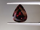 Deep burgundy red to purple Garnet cut in wide pear drop for a pendant. 