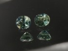 Pair of natural blue green yellow Zircon oval calibrated at 6mm by 8mm from Cambodia