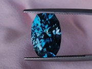 Precision cut top of the range perfectly faceted clean blue zircon cushion over 10 carats